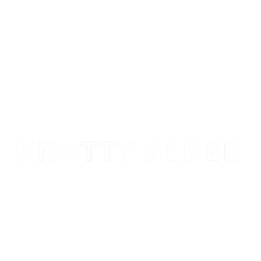 McCoy's Knotty Alder Cabinets logo